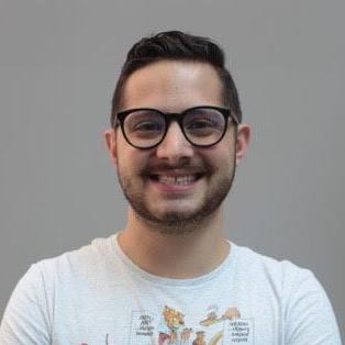 Young smiling man with glasses